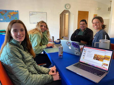 Blue Ribbon Scholars studying with computers